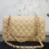 23c26a4f-12cb-4a7e-8660-e69d4fe86fa7 Chanel clásico vainilla réplica